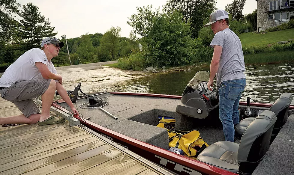 Brandon Grenier (left) and Noah Crogan preparing to go bass fishing on Lake Memphremagog - BEAR CIERI