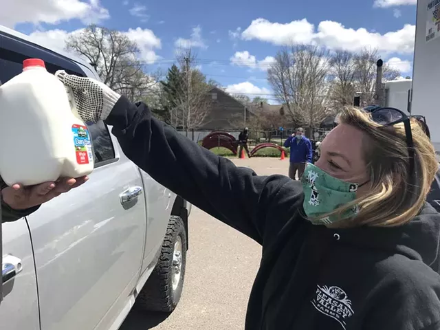 Elle Purrier St. Pierre representing Pleasant Valley Farms at a milk giveaway event in St. Albans in May 2020 - FILE: SALLY POLLAK ©️ SEVEN DAYS