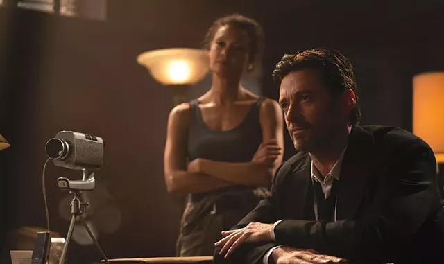 THANKS FOR THE MEMORIES Jackman sells people pieces of their own pasts in Joy's disappointing sci-fi noir. - COURTESY OF WARNER BROS. PICTURES