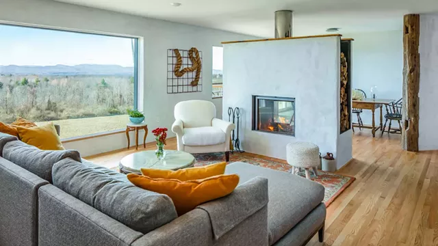 Native wood was used in the flooring, and the triple-layer bay windows are energy-efficient. - COURTESY OF MARK BAYER/NEW FRAMEWORKS