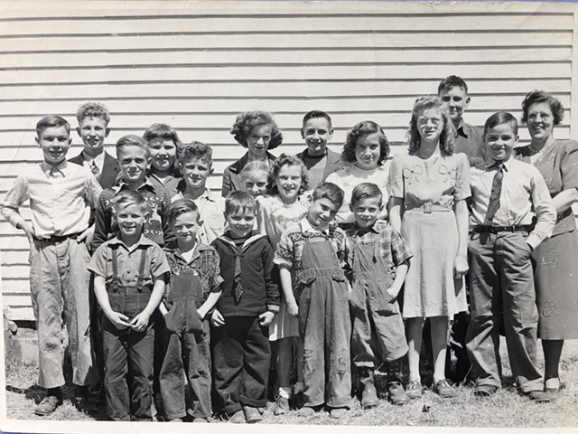 The student body in 1947. Rodney Noble is in the front row, second from right. - COURTESY OF HOLIDAY IN THE HILLS ©️ SEVEN DAYS
