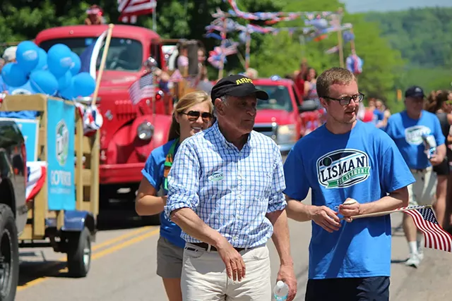 Gubernatorial candidate Bruce Lisman marches Monday in Vergennes' Memorial Day Parade. - PAUL HEINTZ