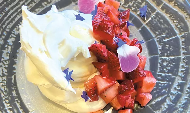 Pavlova with macerated strawberries, rose and geranium from bramble - COURTESY OF BRAMBLE
