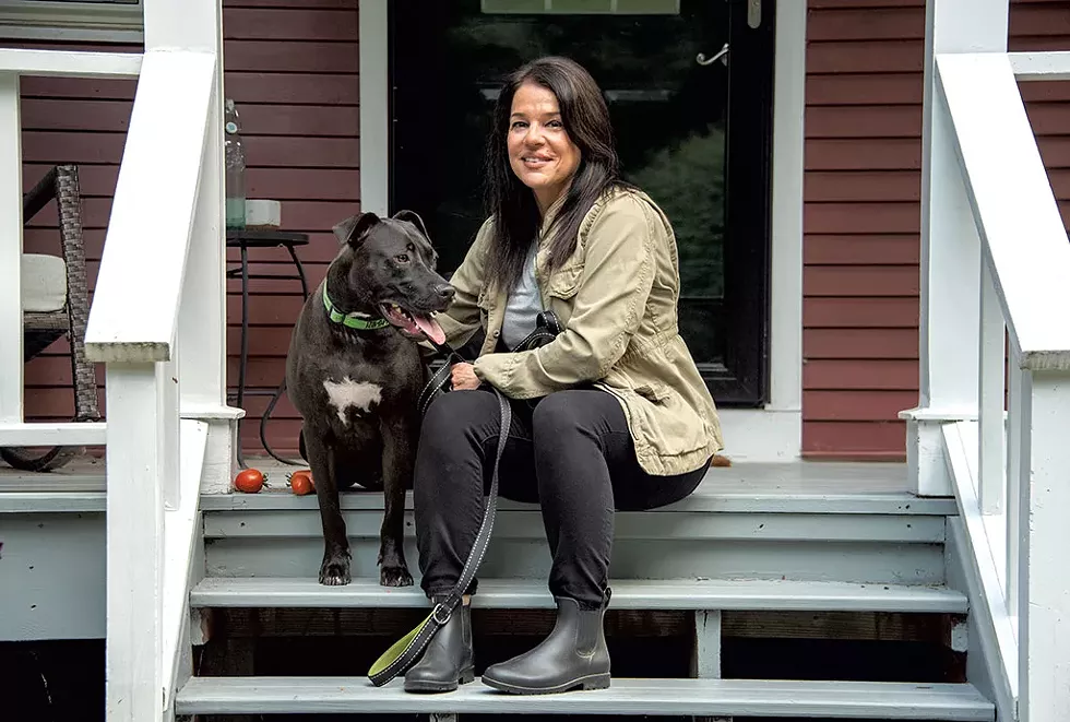 Brenna Galdenzi with her dog, Snoopy, at her home in Stowe - JEB WALLACE-BRODEUR
