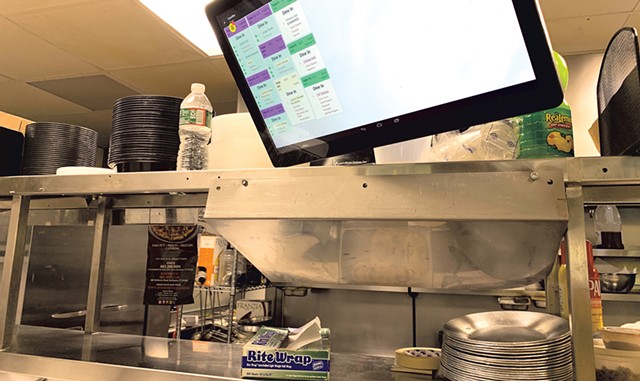 Kitchen screen at Mimmo's Pizzeria &amp; Restaurant in South Burlington, helping staff track orders - MELISSA PASANEN