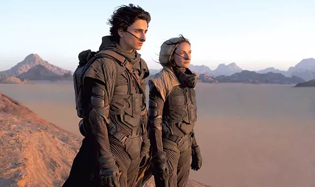 SAND TRAP Chalamet and Ferguson fight to survive the desert — and reams of exposition — in Villeneuve's sci-fi adaptation. - COURTESY OF WARNER BROS. ENTERTAINMENT