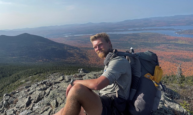 Brandon Weis atop a mountain in Maine - COURTESY OF BRANDON WEIS