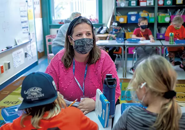 Substitute teacher Adrienne MacIntyre teaching a second-grade class at Mary Hogan Elementary School in MIddlebury - CALEB KENNA