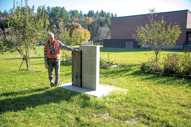 Public Art Commission member Bob Hannum by the monument - JEB WALLACE-BRODEUR