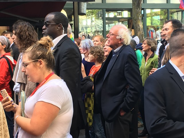 Sen. Bernie Sanders marches down Church Street. - MATTHEW ROY
