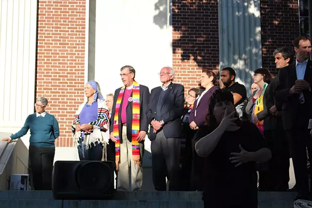 Sen. Bernie Sanders, center, at a vigil Monday at Burlington City Hall - PAUL HEINTZ
