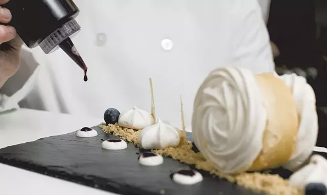 The plating of a dessert - COURTESY