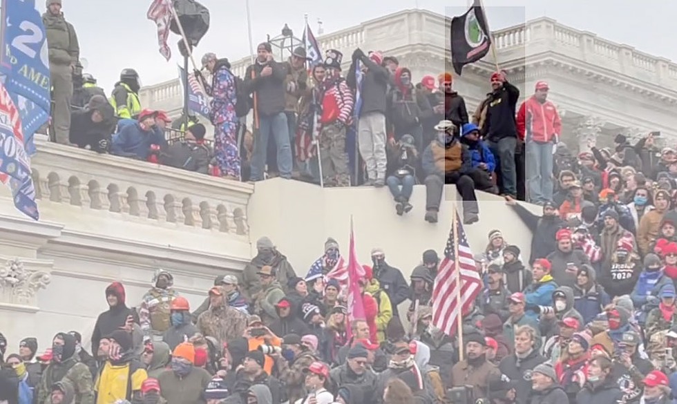 Languerand at the Capitol with his Pepe the Frog flag on January 6 - COURTESY OF U.S. DEPARTMENT OF JUSTICE