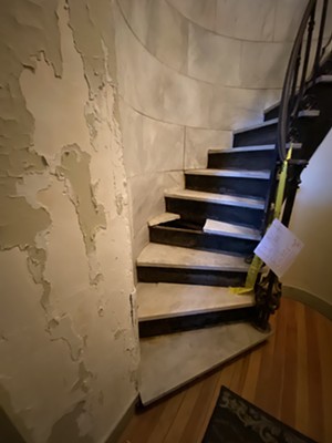 A broken marble stair tread at Fletcher Memorial Library in Ludlow - VERMONT DEPARTMENT OF LIBRARIES