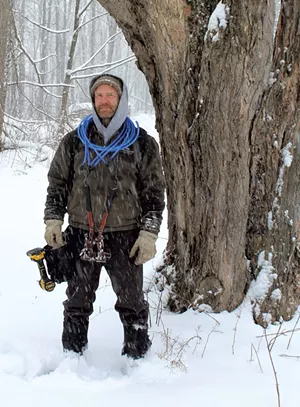 Vermont Almanac coeditor Dave Mance III at his Shaftsbury sugar bush - COURTESY