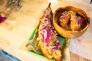 A stuffed canoa and empanadas at Café Mamajuana - FILE: JAMES BUCK