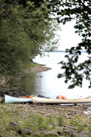 Canoes at Burton Island State Park - FILE: STINA BOOTH