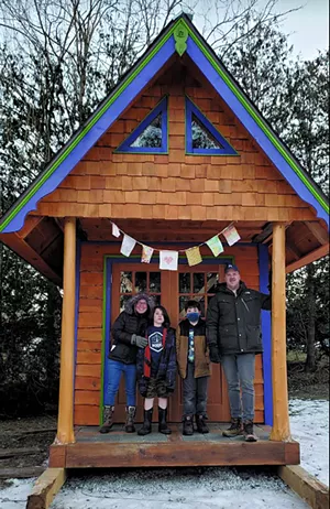 Karen and Chris Rodgers with twin boys John and Julian - COURTESY