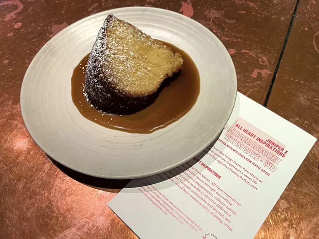 Ferene Paris Meyer's Haitian Barbancourt Rhum cake at Juniper Bar & Restaurant - JORDAN BARRY ©️ SEVEN DAYS
