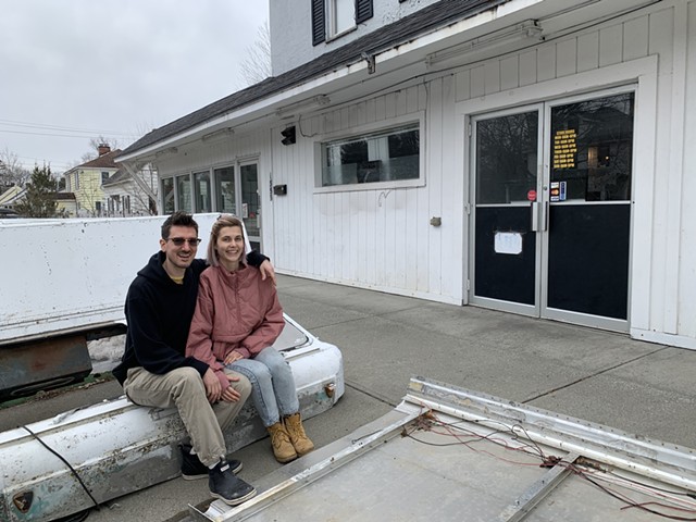 Trevor Sullivan and Lisa Bergström sitting on the truck that will become the New North End Pingala coffee bar - MELISSA PASANEN ©️ SEVEN DAYS