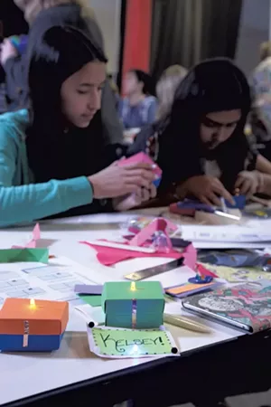 Girls create light-up boxes - MATTHEW THORSEN