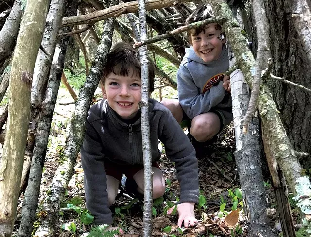 Felix and Leo explore a tree-branch structure - COURTESY OF BENJAMIN ROESCH