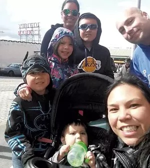 The Nystrom family with au pair Daris Diaz (top)