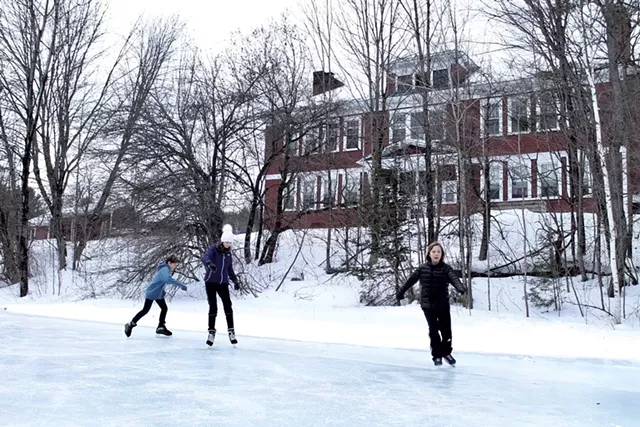 Skaters glide in the shadow of Woodbury Elementary School - MOLLY STANCIU