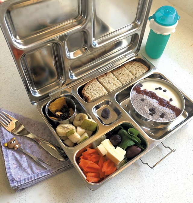 A low-waste lunch packed in a stainless steel PlanetBox - MEREDITH BAY-TYACK