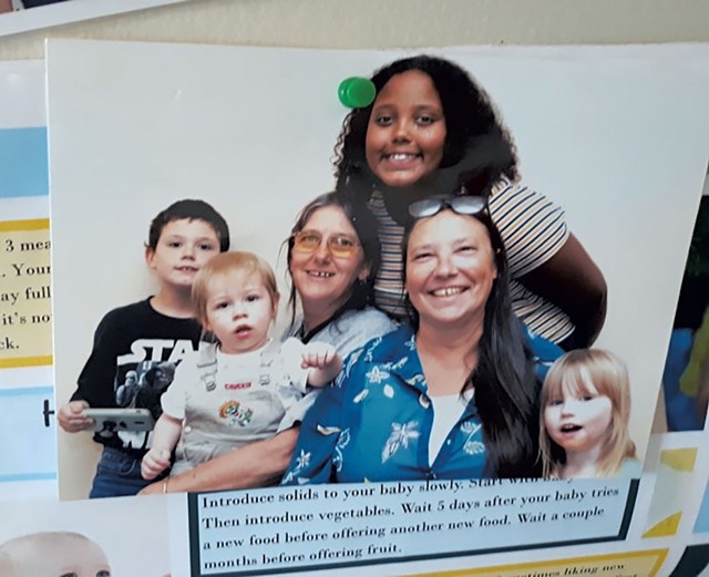 Diane Deso (front, second from right) with grandchildren Kyle, Jamie and Autumn, and Family Room staff member Rosie Senna (with an unrelated child) - COURTESY OF DIANE DESO