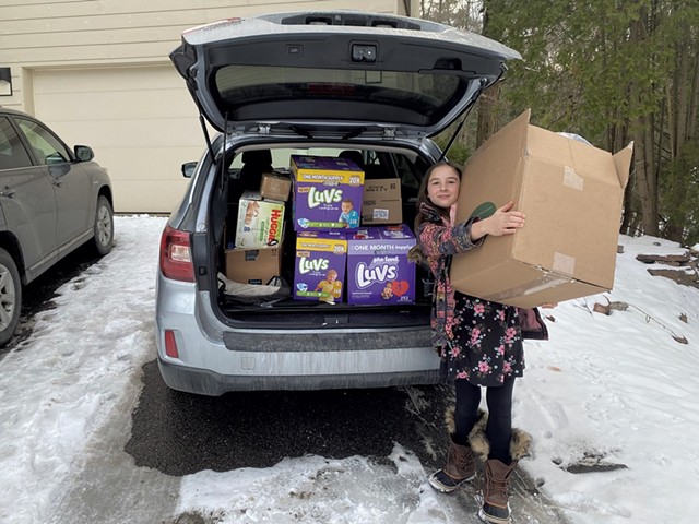 Zoe delivering a carload of supplies