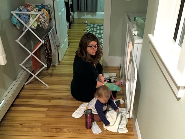 Meredith folding laundry with her daughter - COURTESY OF MEREDITH BAY-TYACK