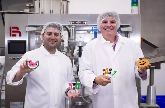 Steve Montanez and Ben Clark with cookies - ANN CLARK