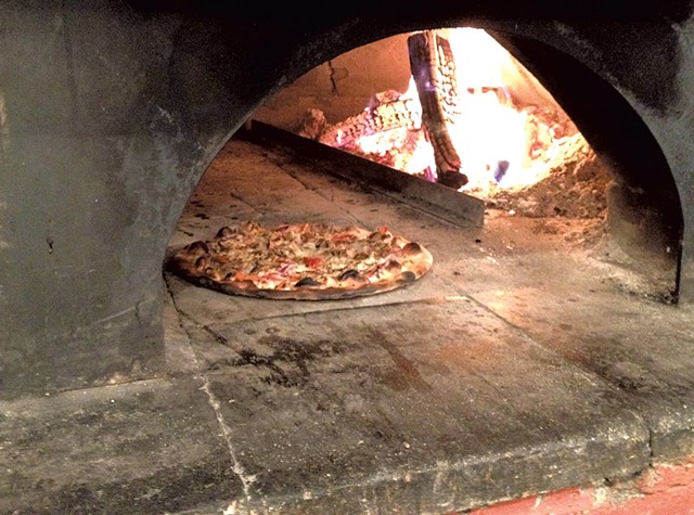 Wood-fired pie from Pizza on Earth - COURTESY