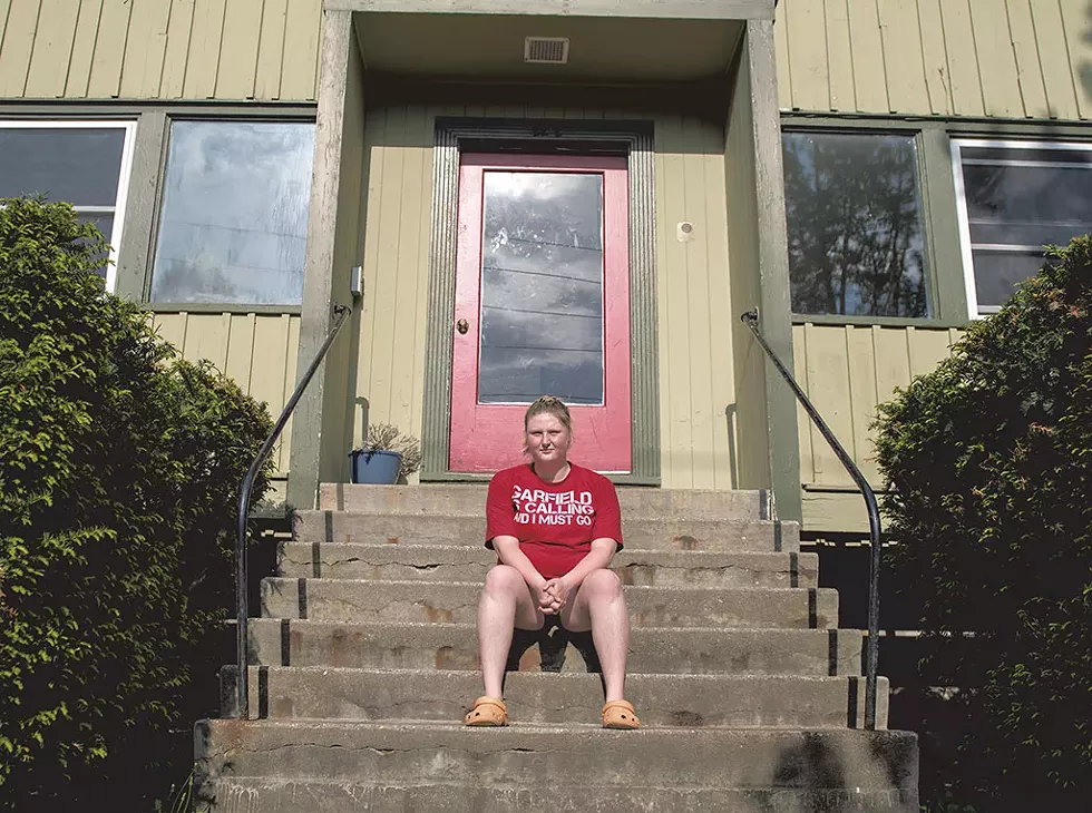 Cadence Shuman in front of her apartment - DARIA BISHOP