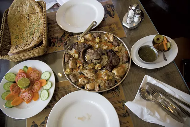 Afghan Ukraine Refugee Dinner - © ROBIN BATISTA | DREAMSTIME