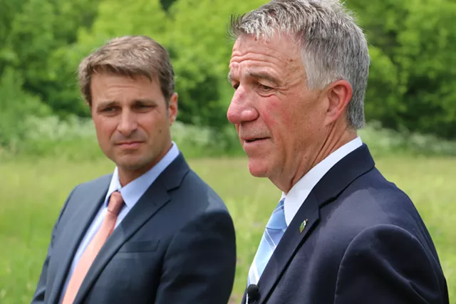 Josh Hanford, commissioner of Housing and Community Development, and Gov. Phil Scott - KEVIN MCCALLUM