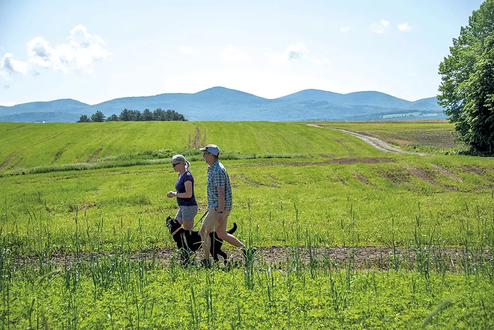 Patty and Ken Valentine walking their dog Una on the Templeton-Fairmont Trail - JEB WALLACE-BRODEUR