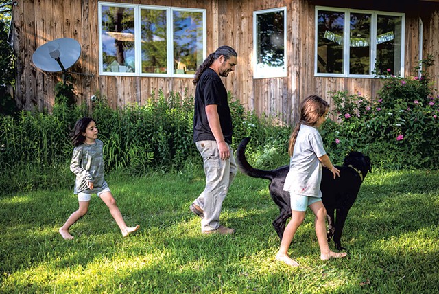Dan Pomerantz with his daughters, Maya and Leya, and dog, Charlie - JOSH KUCKENS