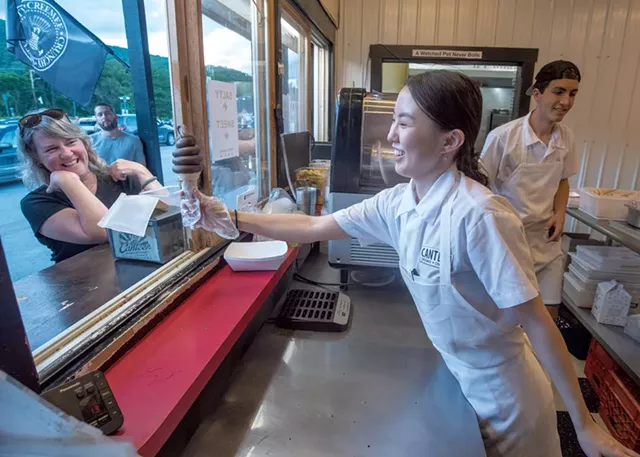 Ura Boldbaatar, from Mongolia, serving ice cream at Canteen Creemee - JEB WALLACE-BRODEUR
