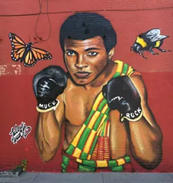 The Muhammad Ali mural at the Mawuhi African Market - MATTHEW ROY
