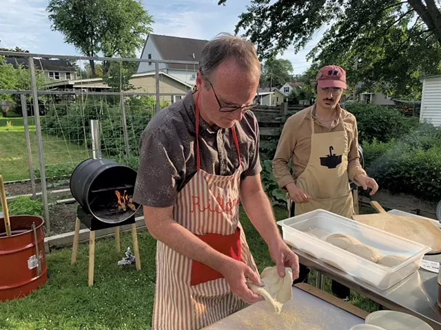 Richard (left) and Bastien Gliech preparing tartes flambées - MELISSA PASANEN