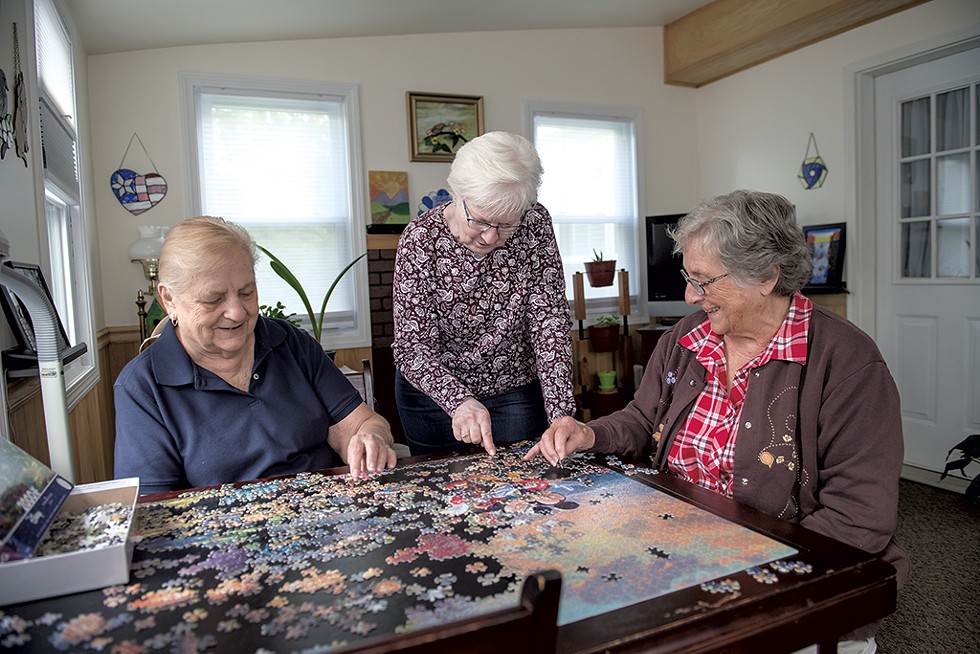 From left: Fran Streeter, Cheryl Walker and Caroline Ford working on a puzzle - DARIA BISHOP