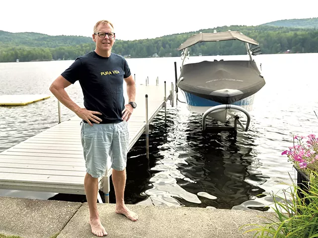 Rodney Putnam and his wake boat on Lake Iroquois - BEAR CIERI