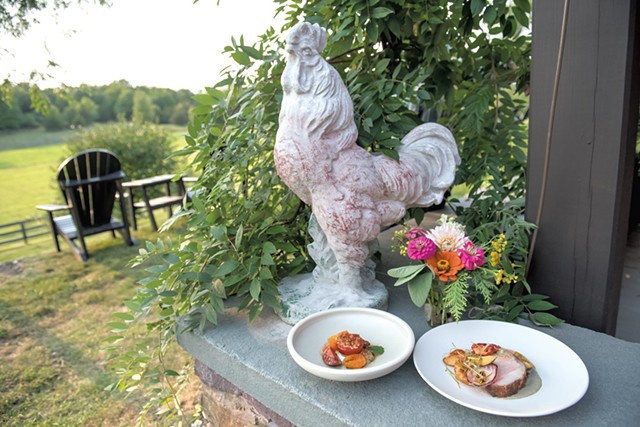 Tomato with eggplant, zucchini, sweet pepper and ricotta (left) and roasted pork shoulder with mushrooms, potato, sweet pepper, okra and peach barbecue sauce at Philo Ridge Farm - DARIA BISHOP
