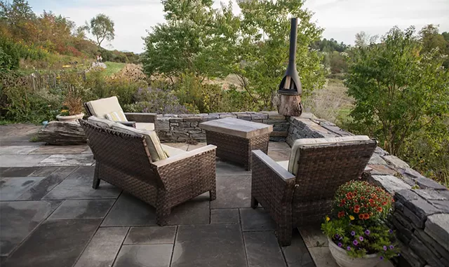 The stone terrace at the Lindenmeyrs' house - DARIA BISHOP