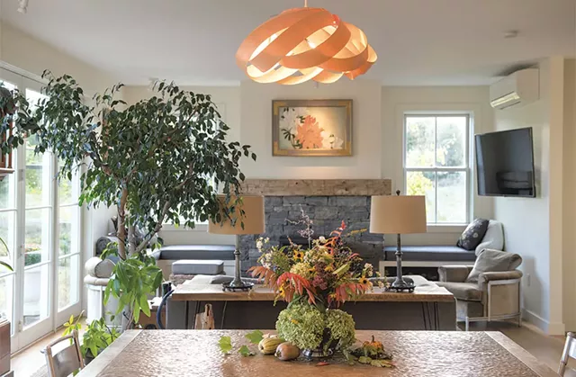 The dining and living area of the Lindermeyrs' home - DARIA BISHOP