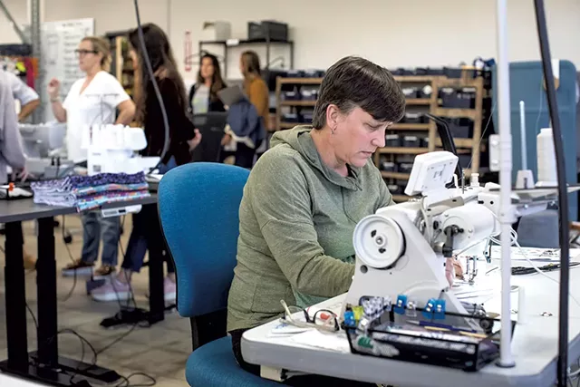 Fourbital Factory employee Kate Voorhees - LUKE AWTRY