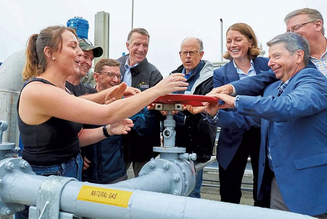 Danielle Goodrich Gingras (left) leading a ceremonial turning of the spigot to start the flow of gas at her family farm's renewable energy facility - COURTESY OF VANGUARD RENEWABLES
