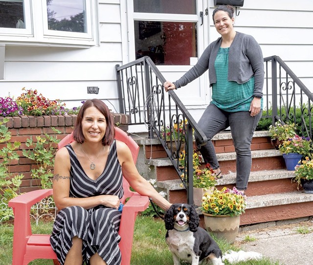 Theresa Mazza with her dog, George, and Amy Ross at the home they share in Burlington - COURTESY OF KAREN PIKE